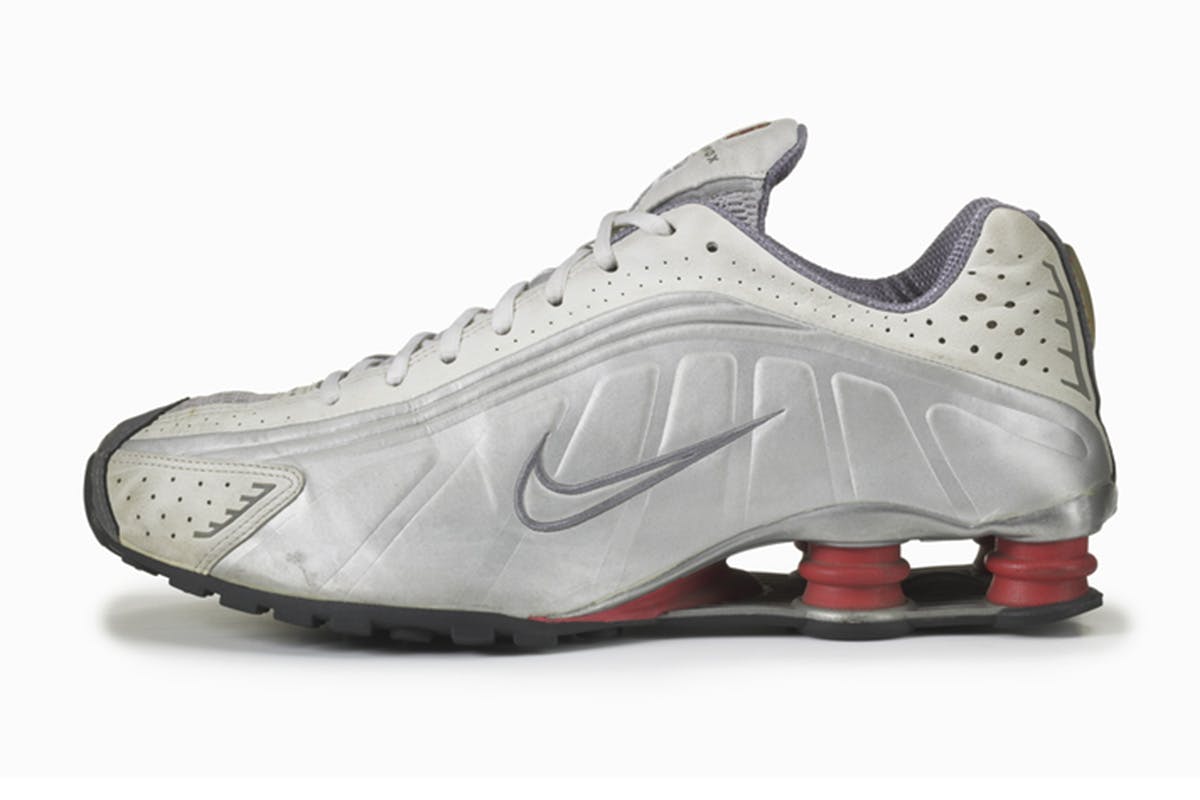 nike shock absorber trainers